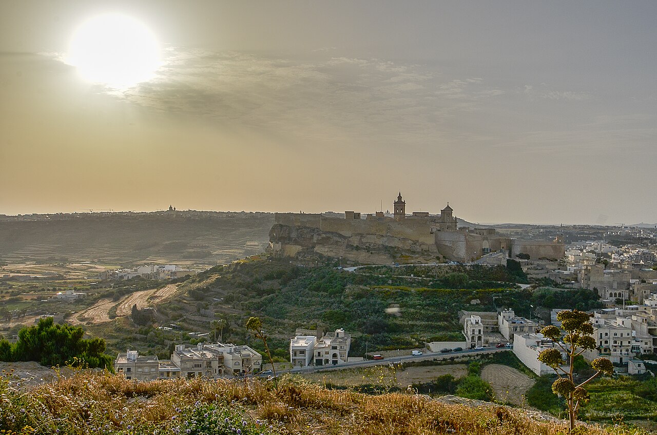 Gozo’s Citadella rising above Victoria in warm evening light.