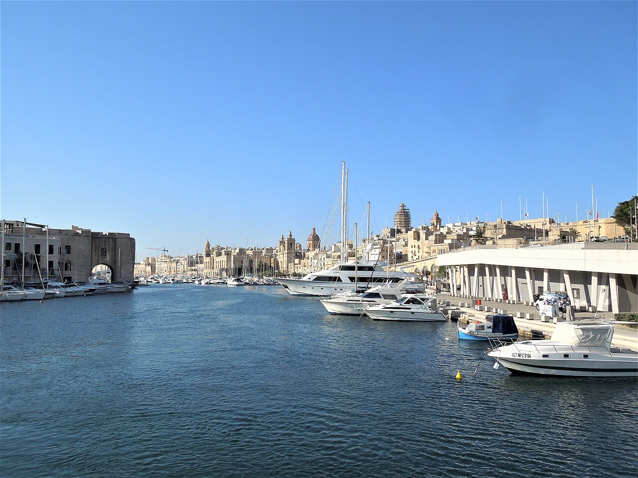 Yachts beside Birgu’s limestone waterfront in the Three Cities.